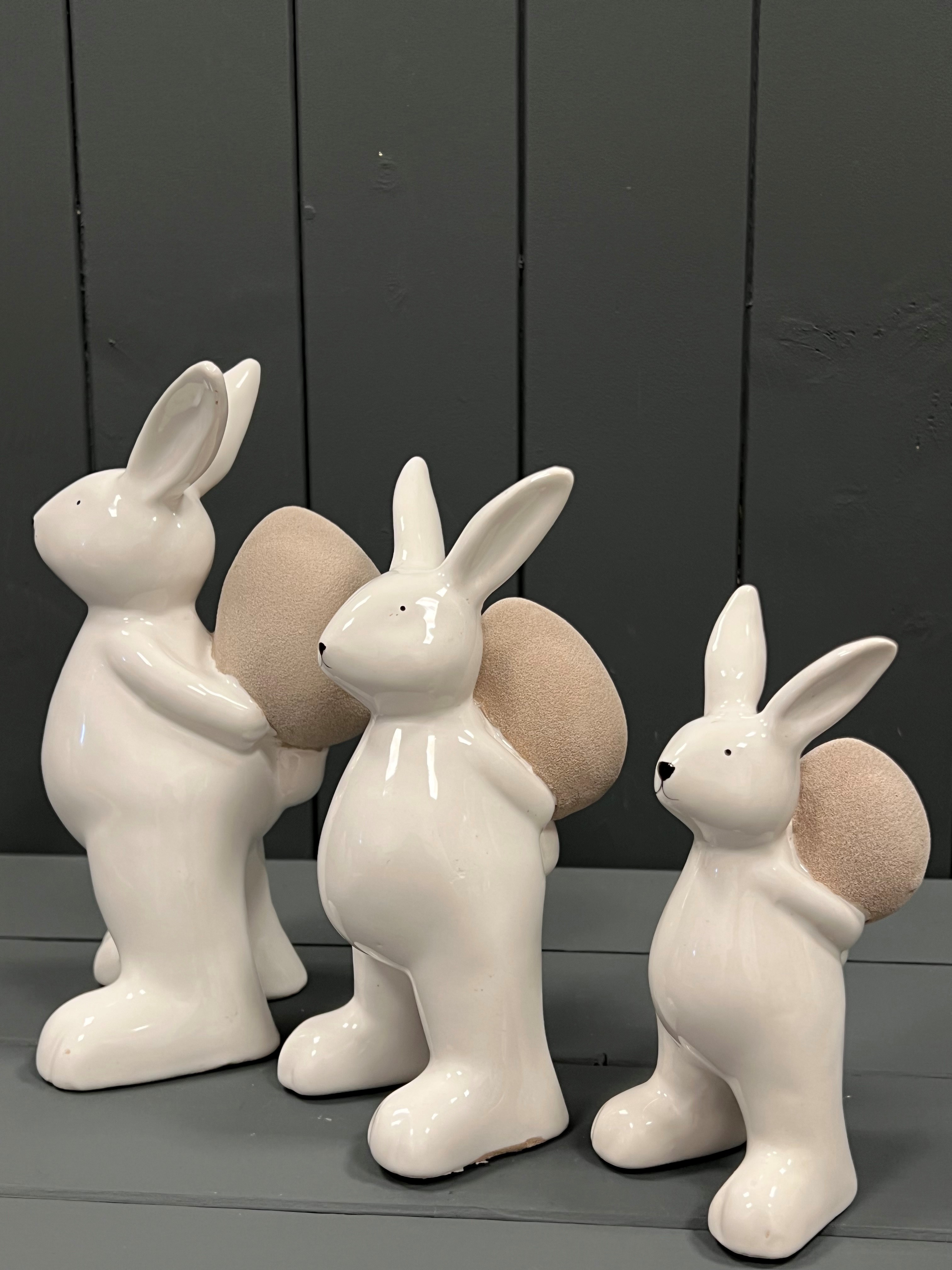 Group of White Ceramic Rabbit with Sand Finish Easter Egg